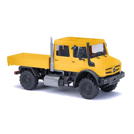 Busch 51080 Mercedes-Benz Unimog U 5023 Dubbelkabin, gul